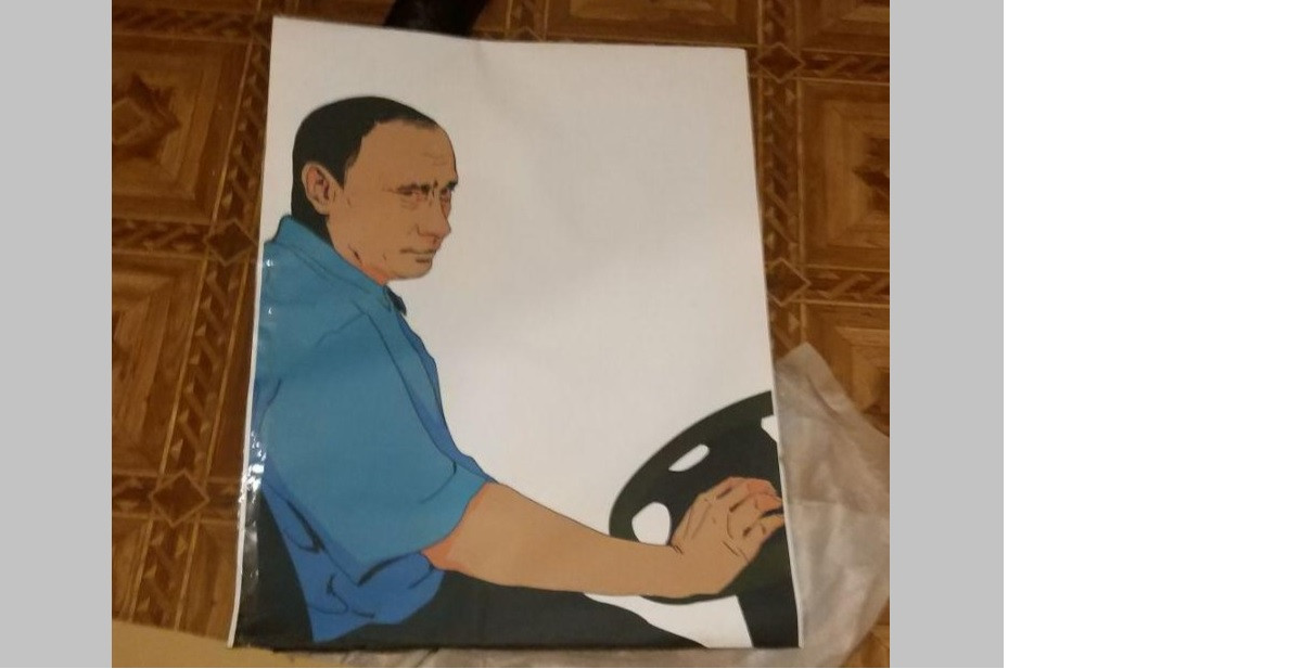 Портрет Путина перед акцией